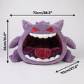 Purple monster cave pet bed with an open mouth design, white felt teeth, and soft red cushion.